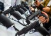 Court Smacks ‘Catch-22’—Gun Lawsuits Unleashed Handguns on display at a store counter