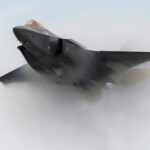 Stealth fighter jet piercing a vapor cloud