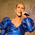 Celine’s Tearful Return Stuns Arena – Paris Roars Singer performing in a blue metallic dress