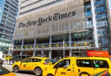 Protest Motives Muffled – By The Times? New York Times building with yellow taxis in front