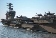 Cold War Relics Crumble – Did Israel Finish Iran’s Tomcats? Aircraft carrier at sea with fighter jets on deck