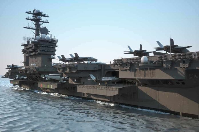 shutterstock_300162086 Aircraft carrier at sea with fighter jets on deck