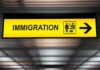 Risky Detours: DHS Workaround Sparks Fury Immigration sign with arrow in airport