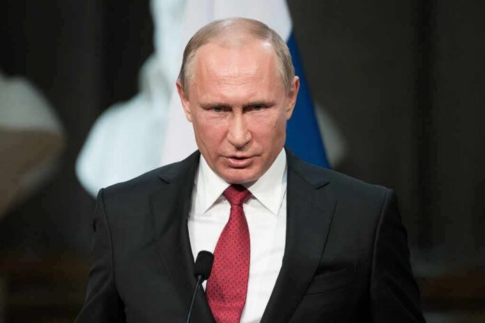 Vladimir Putin speaking at a podium with a microphone