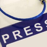 Court Order Ignored? Xi Dinner Meltdown Press badge with blue lanyard