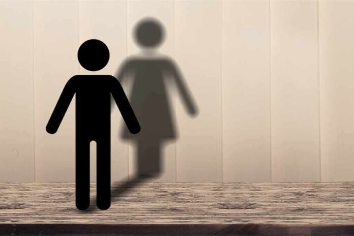 male stick figure casting a female-shaped shadow
