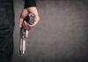 Bend Elementary Ambush – Mystery Shooter Down hand holding a handgun at side