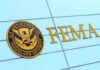 FEMA sign and Homeland Security seal on building facade