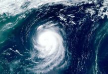 Post-Tropical Punch Eyes California Coast Satellite view of a powerful hurricane swirling over the ocean