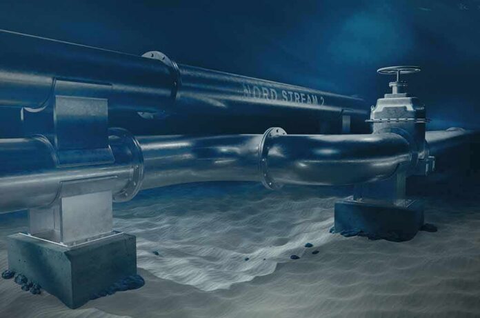 shutterstock_2011862225 Underwater pipeline with valve on seabed