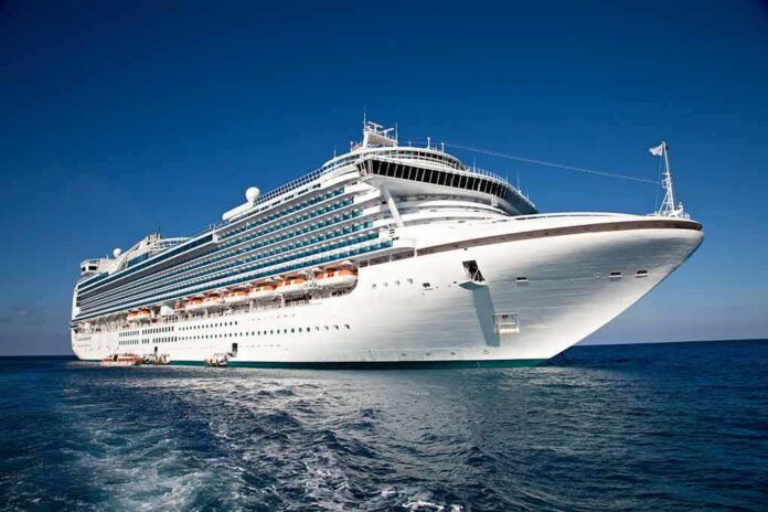 shutterstock_48918724 Large white cruise ship at sea under clear blue sky