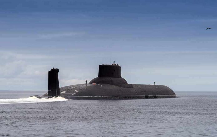 shutterstock_647634085 Submarine cruising on calm sea